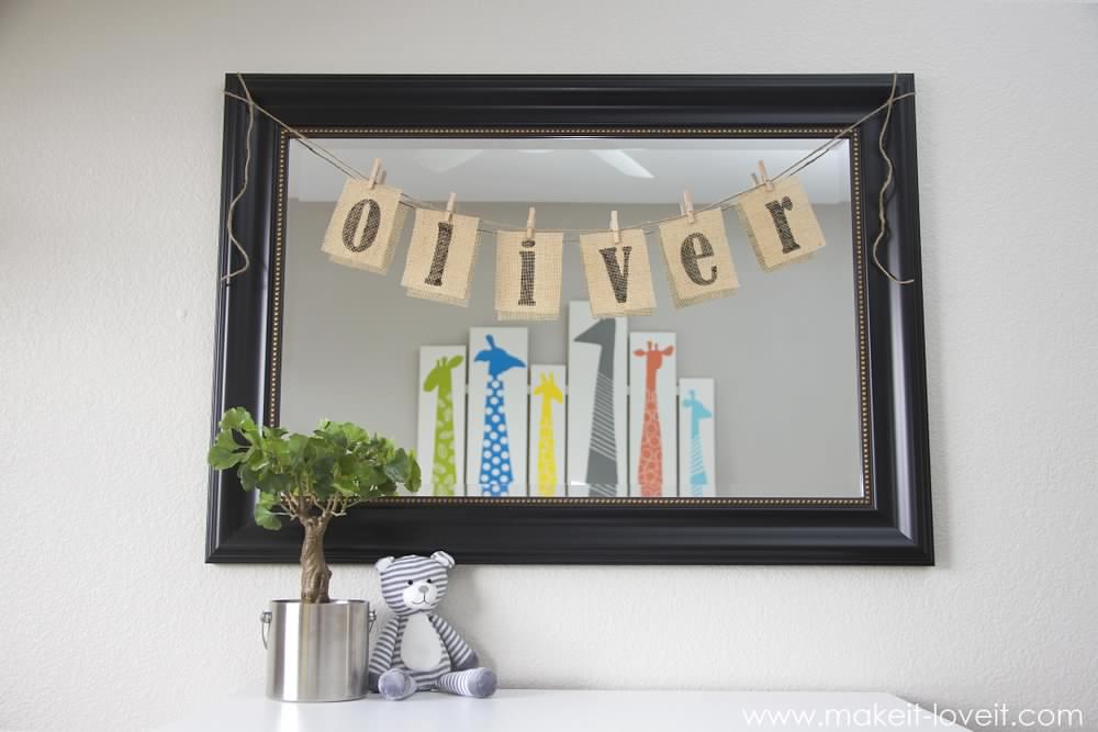 a banner that says oliver hanging on a mirror
