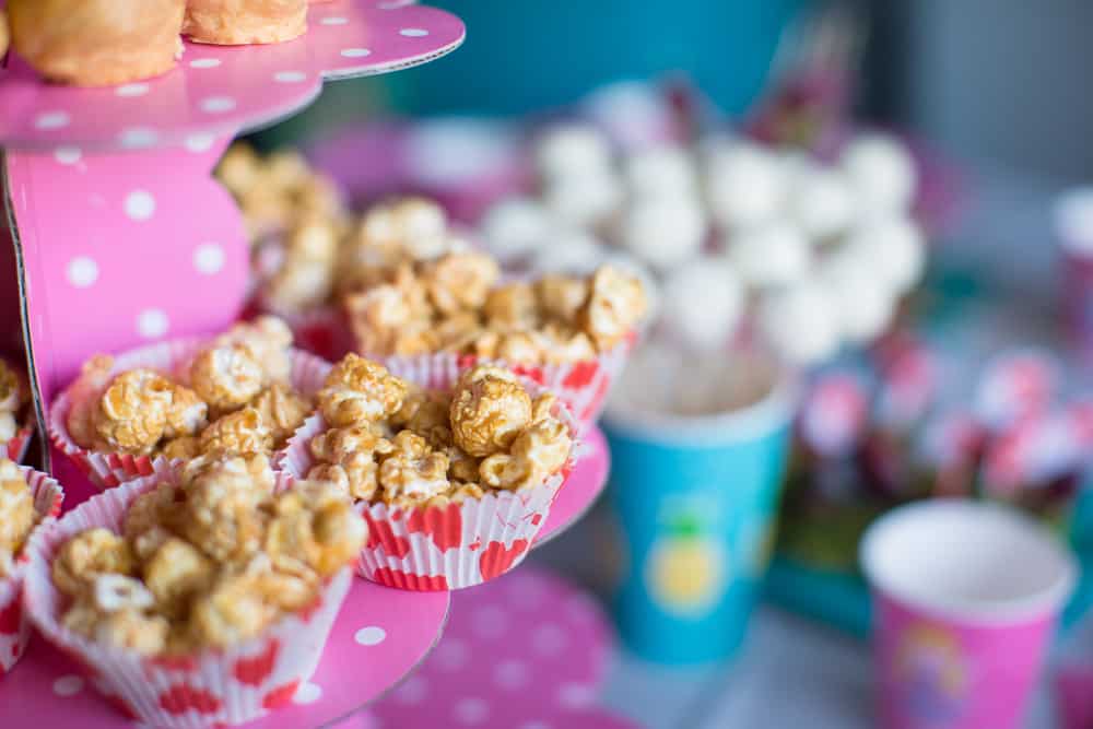 Portion popcorn bar at a baby shower