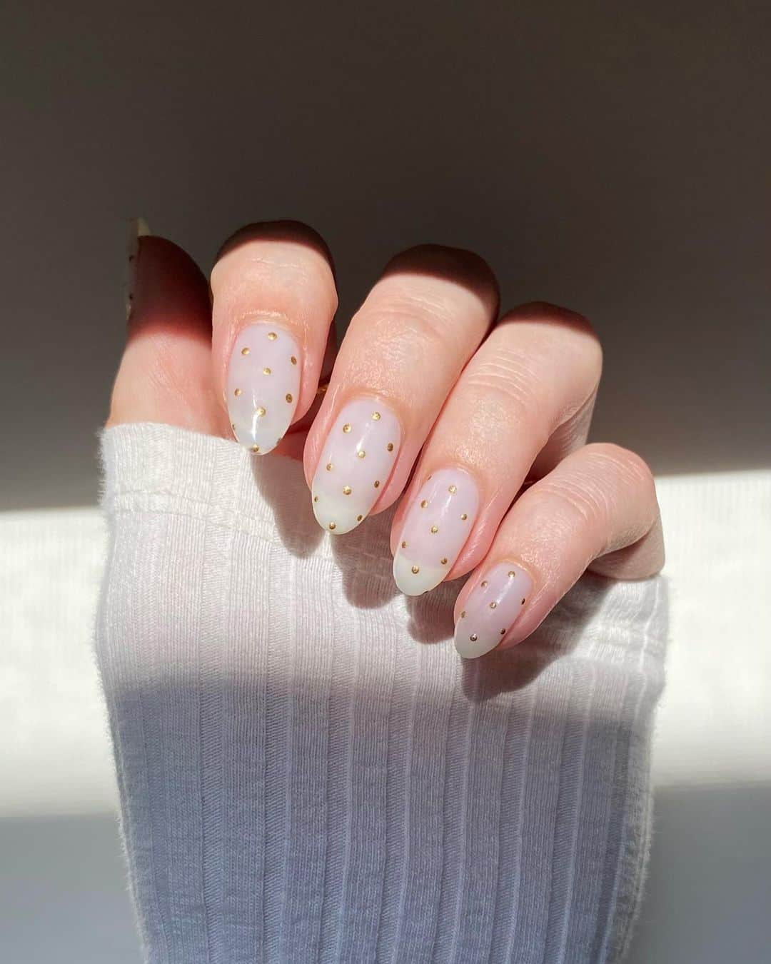 gold dots minimalist nails