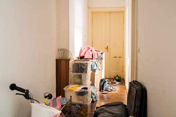 signs that you're a hoarder cluttered hallways