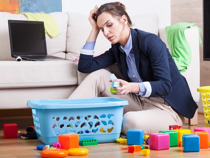 exhausted woman without a spring cleaning checklist
