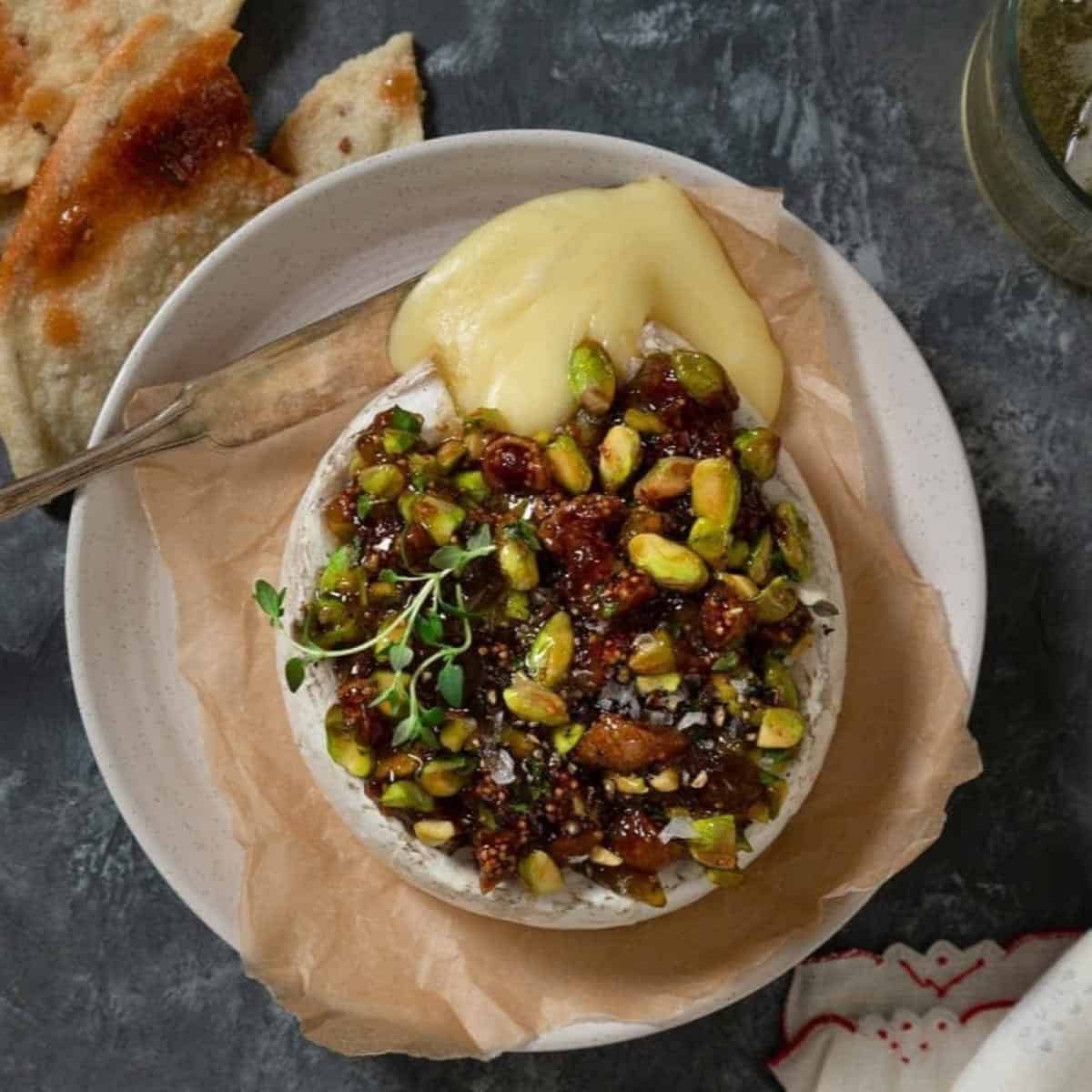 Baked Brie With Fig Jam And Pistachios