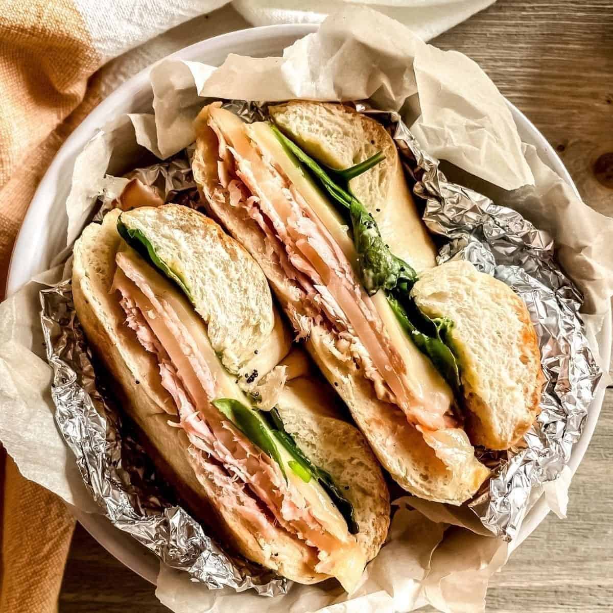 Baked Ham And Cheese Bagel Sandwiches