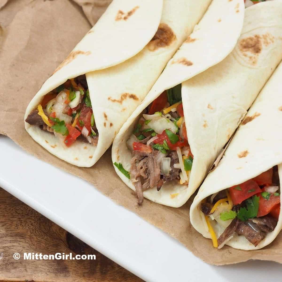 Slow Cooker Shredded Beef For Tacos Sandwiches Stock
